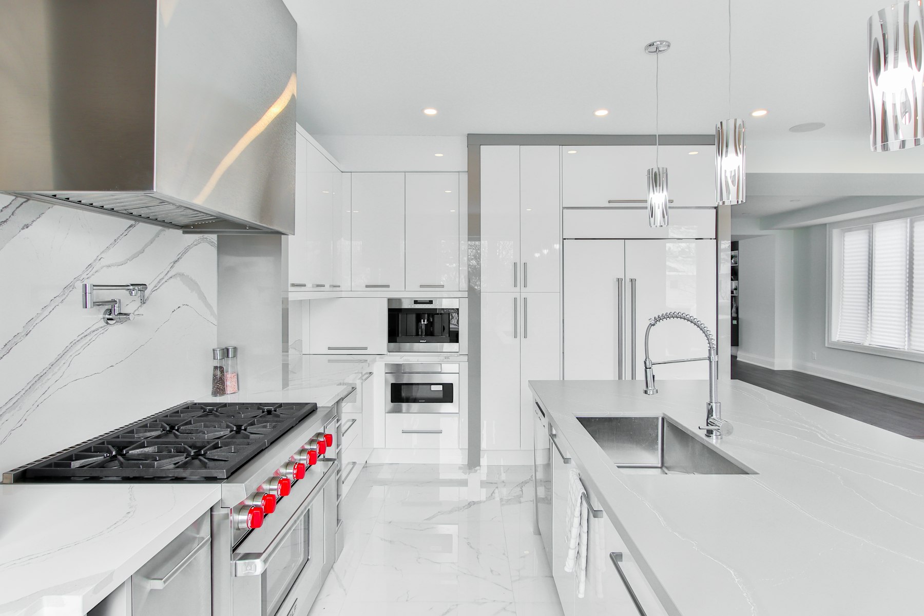 A kitchen in a two-tone cabinet finish, showing a darker palette option