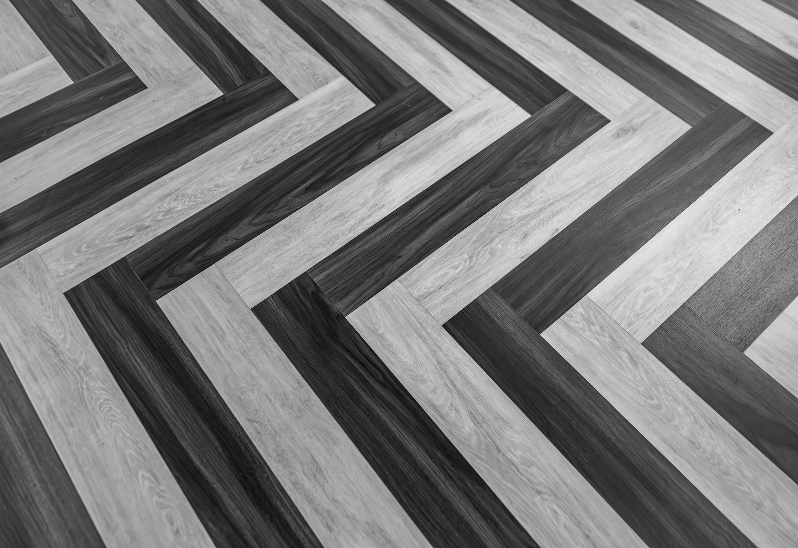 Herringbone tile pattern, representative of our custom tile and backsplash installation work